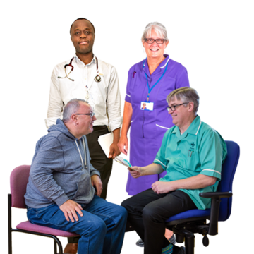 A man sitting taking to a doctor, nurse, and a medical professional