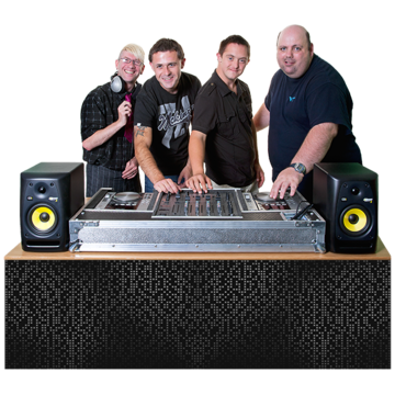 A group stand around a table with dj mixing equipment on it.