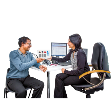A doctor is giving a patient a leaflet 