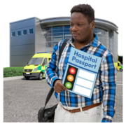 A man standing outside a hospital holding a Hospital Passport