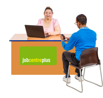 A man sitting talking to someone behind a desk at a jobcentre