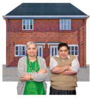 Two neighbours outside their new build houses have their arms folded looking annoyed