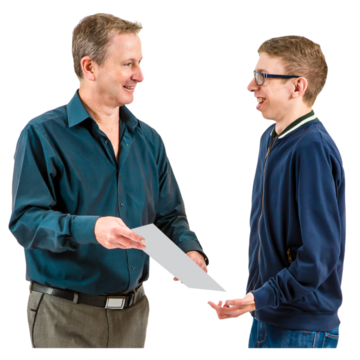 A man is showing another man a piece of paper