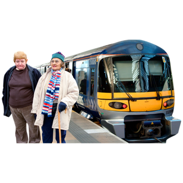 Two people standing next to a train, about to take a journey.