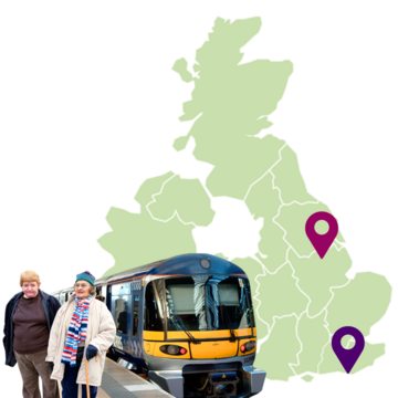 A man and a woman standing next to a train. In the background is a map of the UK with markers on it.