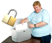 A woman is using a filing box to put a piece of paper into. Next to the filing box is a padlock to keep the paperwork safe