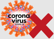 A drawing of the coronavirus next to a red cross