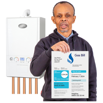 A man holding up a gas bill with a gas boiler behind him
