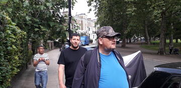 A group of people walking around their community