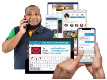 A man on the phone, next to an email open on a tablet, a mobile phone, and other devices