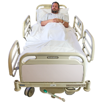 A man in a hospital bed