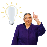 A woman points upwards with a glowing lightbulb next to her
