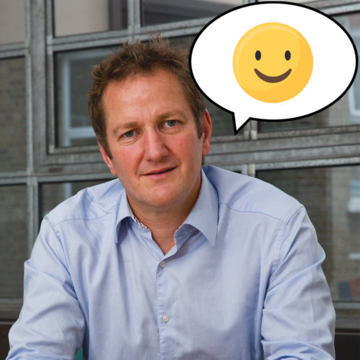 Jon Sparkes with a speech bubble with a happy face inside it