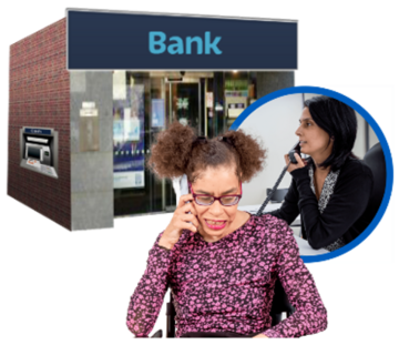A woman on the phone with a bank building behind her
