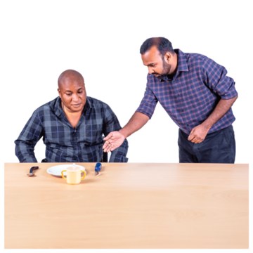 A man giving a nother man a meal