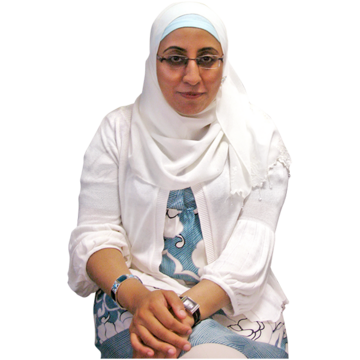A Muslim woman with glasses and wearing a white headscarf