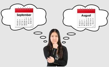 A woman deciding between September or August