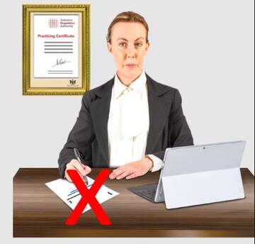 A picture of a solicitor writing a legal letter which has a red cross over it.