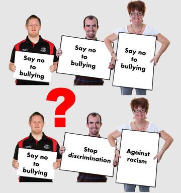 Three people holding the same sign and three other people holding different signs