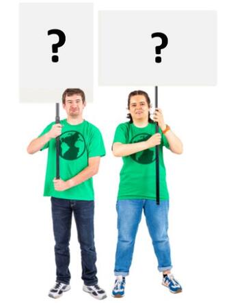 Two people holding up signs with question marks on them