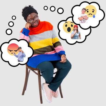 A woman on a chair thinking about people being sad, angry and shocked