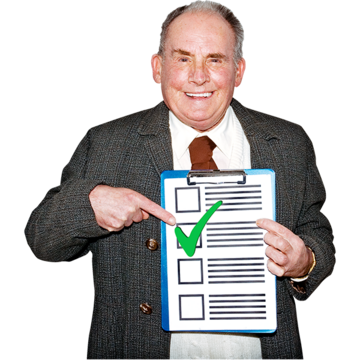 An elderly man holds up a piece of paper with tick boxes on it