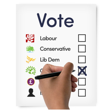 A hand holding a pen writing a cross on a voting ballot paper