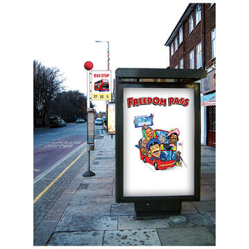 A bus stop with a road and a building.