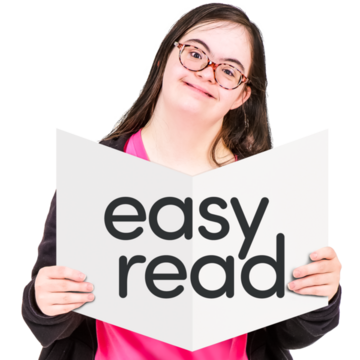 A woman holding up an open book that says Easy Read on the cover
