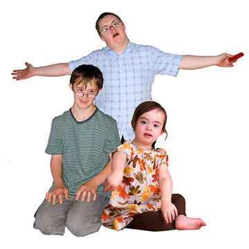 3 people of different ages with Down syndrome.
