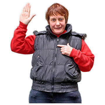 A lady with her hand raised and pointing to herself.