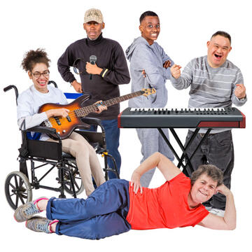 A group of people playing instruments and looking happy with one person lying on the floor in front of the group smiling.