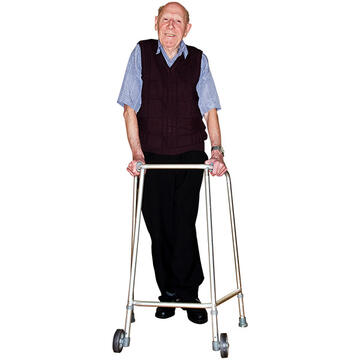 An older man using a walking frame.
