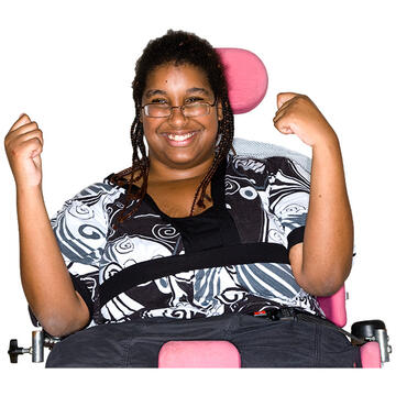 A lady in a wheelchair smiling and looking happy.