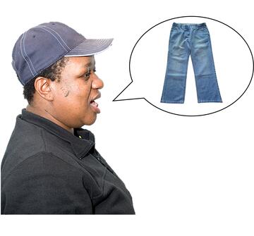 A woman talking with a picture of a pair of jeans in the speech bubble.