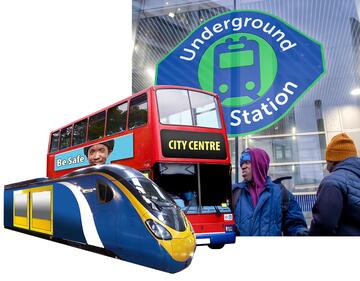 A train, a bus and a sign for an underground station.