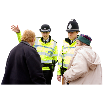 Two women talking to police officers