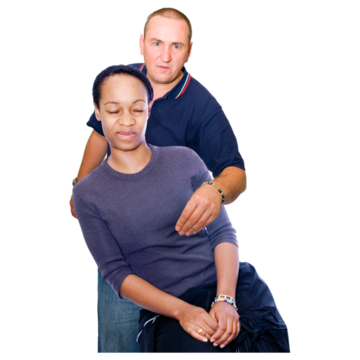 A man is touching a woman's breast and she is trying to move away from him