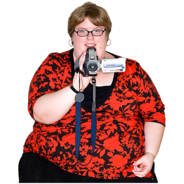 A woman using a video camera to film something