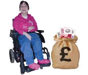 A woman in a wheelchair with a bag of money beside her.
