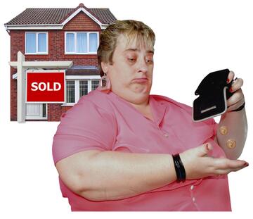 A house with a sold sign and a woman with an empty purse.