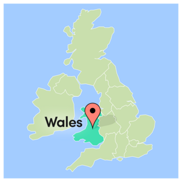 A map of the UK with Wales marked by a map pin
