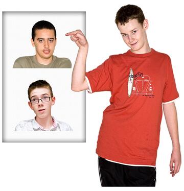 A boy pointing to the top picture on a board which has photos of 2 male faces on it.
