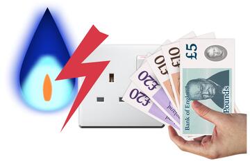 A hand holding some money beside a gas flame and an electric socket.