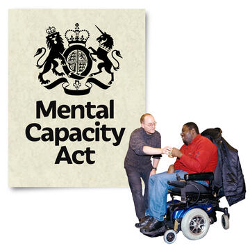 A sheet of paper saying Mental Capacity Act and a man offering a man in a wheelchair a drink.