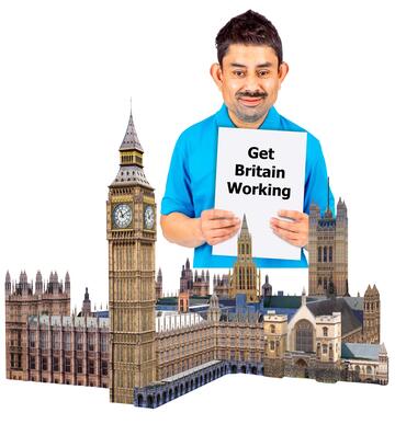 A man behind the Houses of Parliament holding a piece of paper which has Get Britain working written on it.