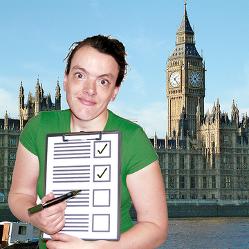 A person is in central London holding a checklist