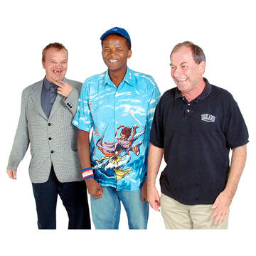 Three men standing together smiling.