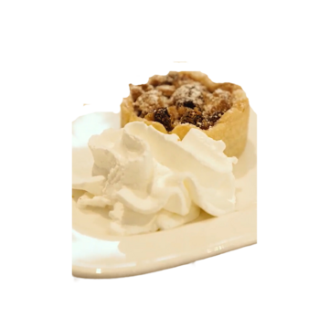 A mince pie with some cream beside it.