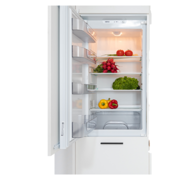 A fridge with the door open showing the food inside it.